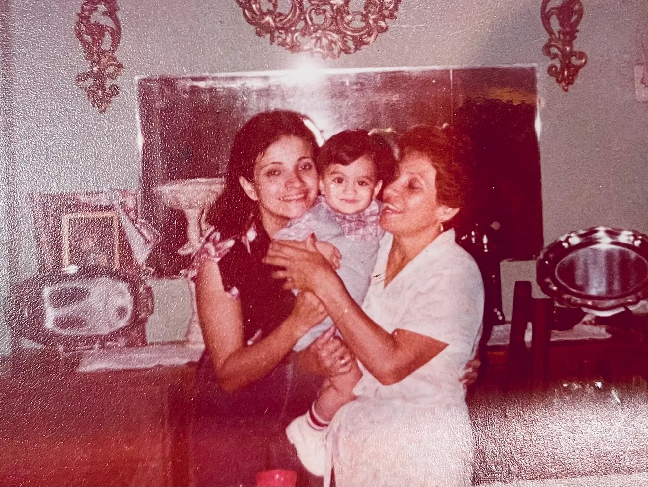 Agustin with his mother and his grandmother. Courtesy of Rafael Agustin