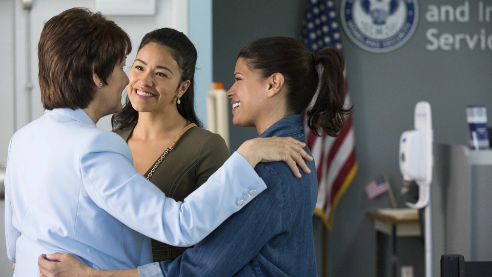 Alba (Ivonne Coll, left) celebrates after passing her U.S. citizenship test in Season 4 of 'Jane the Virgin'